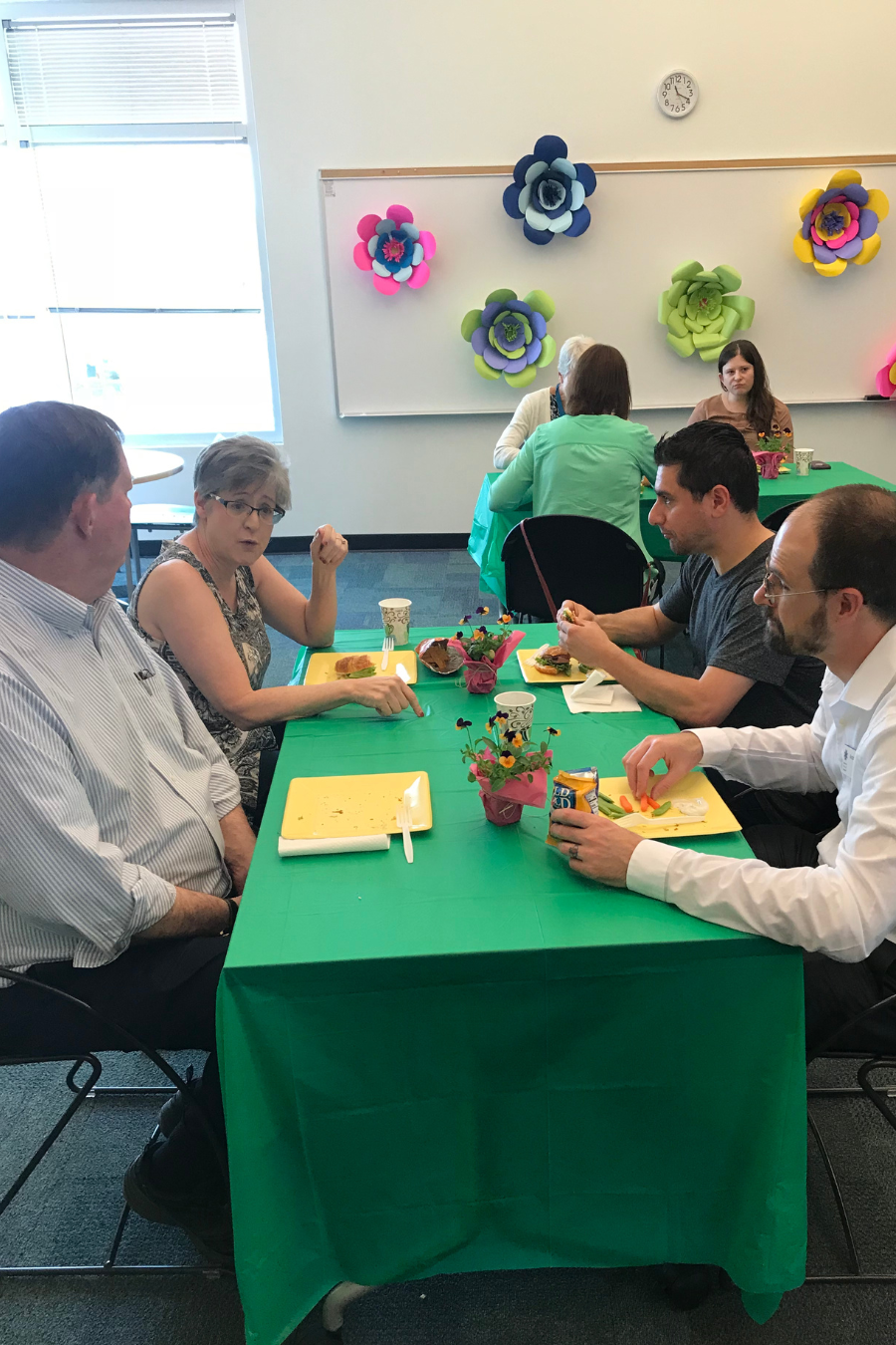 people talking at a table